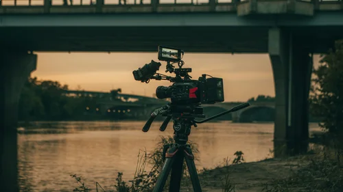 Cinema camera rig filming on location at dusk